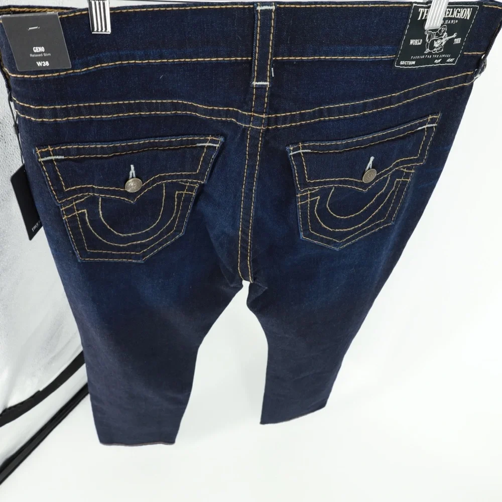 TRUE RELIGION RAZOR DARK RIPS‎ GENO FLAPS RELAXED SLIM JEANS